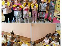 Dzieci z grupy żabek wykonujące zabawy tematyczne z okazji Dni Psa.